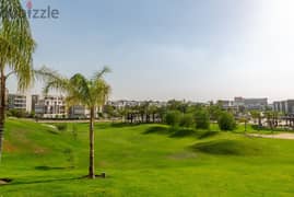 An apartment with a private garden in Taj City Compound, a distinctive location, with a 10% down payment over 8 years, an area of 130 m, a garden 45