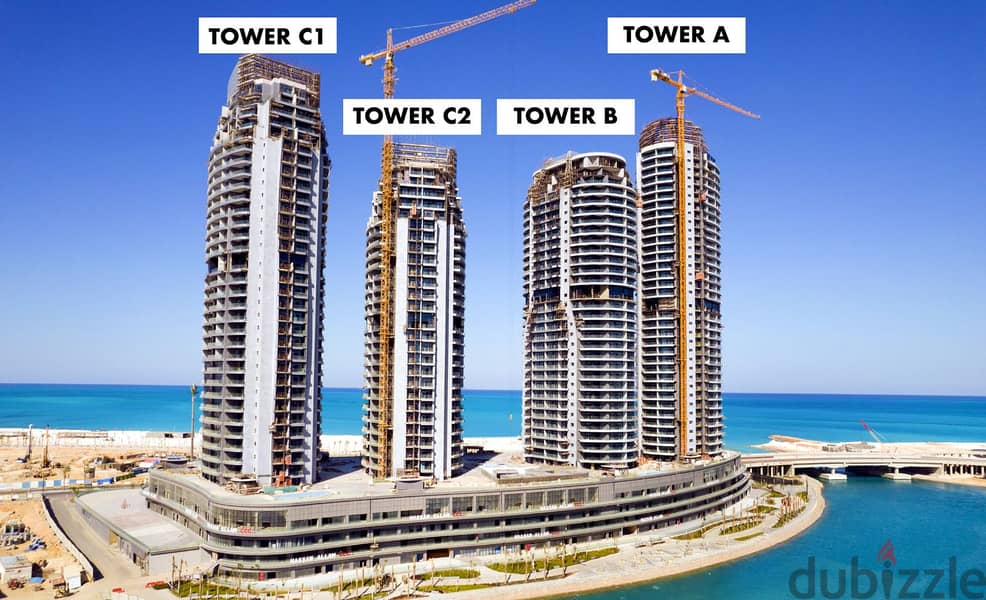 For sale, 280 sqm apartment (double view), direct to the sea, finished with air conditioners, in New Alamein Towers 3