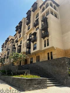 Immediately received a 124 sqm apartment (finished) in front of the Majar El Oyoun wall in the new city of Fustat, in installments over 7 years.