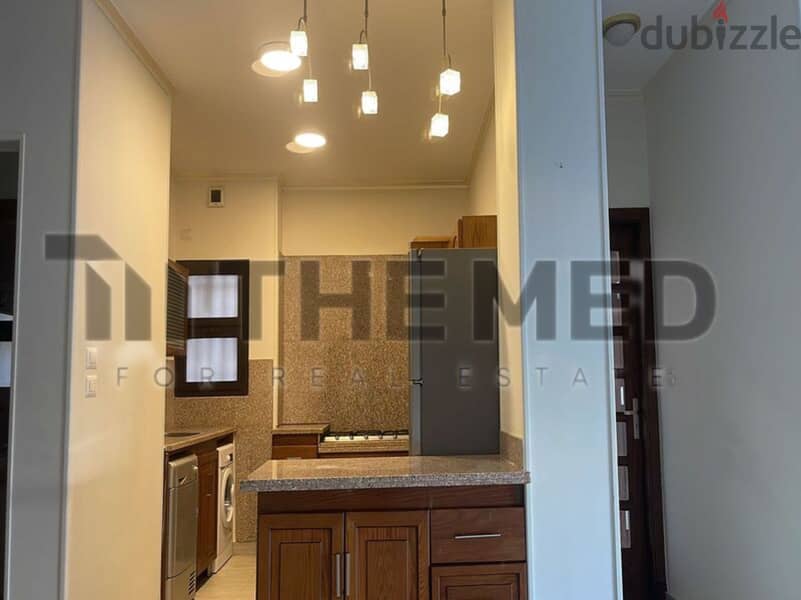 Apartment for rent with kitchen and air conditioners in Westown Sodic Sheikh Zayed Compound 3