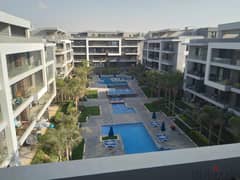 Apartment Delivery Now in El Patio Oro Lavista in Fifth Settlement In golden square A very distinctive view of the landscape and water bodies 0
