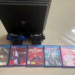 Playstation 4 pro 4k with stand and 2 joystick original and 5 cds 1