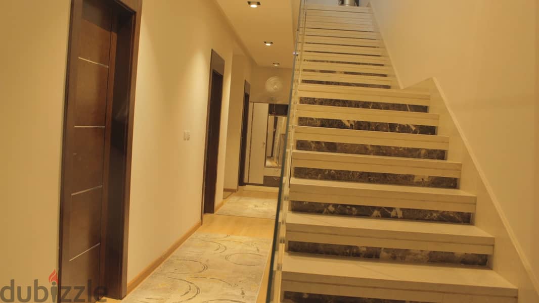 duplex for sale 265M  fully finished ultra super lux prime location  view garden  Hyde Park new cairo 4