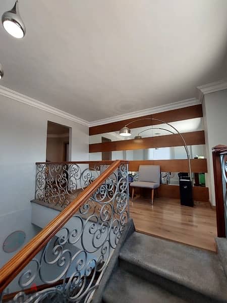 A very prestigious duplex with a wide view on shooting club in Dokki. 4