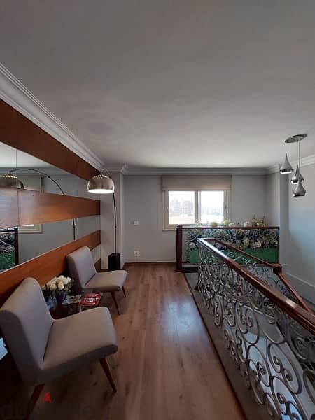 A very prestigious duplex with a wide view on shooting club in Dokki. 5