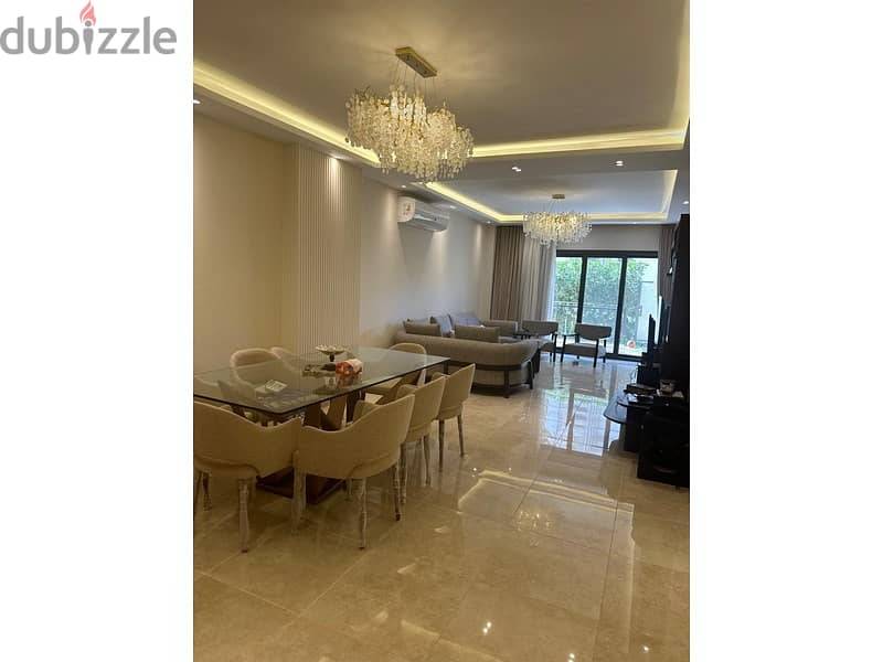 Apartment with garden for sale, ready to move , in Fifth Settlement, Golden Square, luxuriously finished, in Fifth Square 9