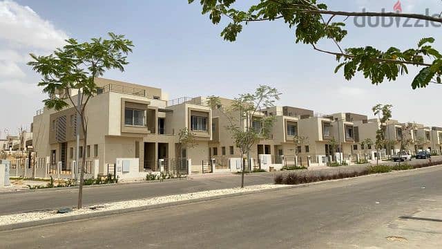 Semi-finished middle townhouse with private roof in Palm Hills, New Cairo  With the best view, the largest open view and landscape, 2