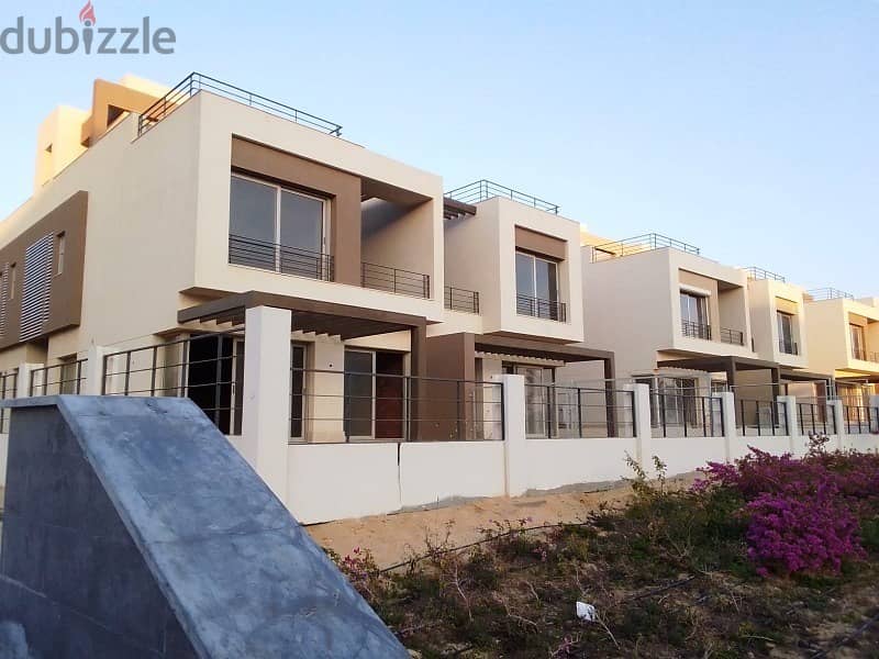 Semi-finished middle townhouse with private roof in Palm Hills, New Cairo  With the best view, the largest open view and landscape, 5