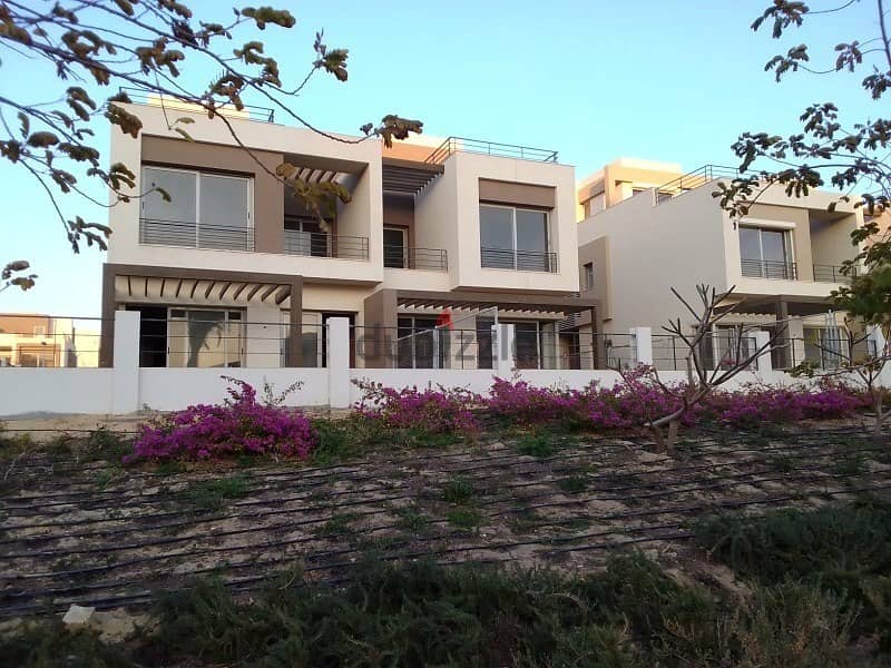Semi-finished townhouse for sale in installments in the best location in Palm Hills, New Cairo 3