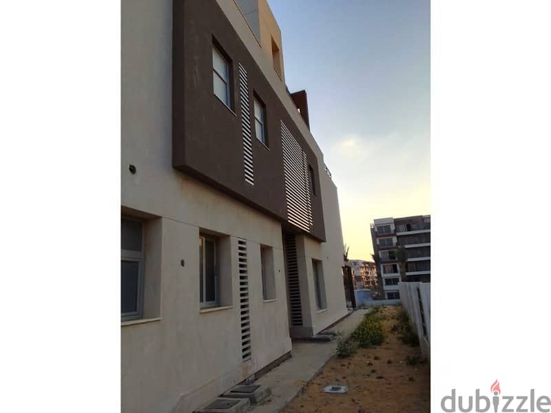 Semi-finished townhouse for sale in installments in the best location in Palm Hills, New Cairo 5