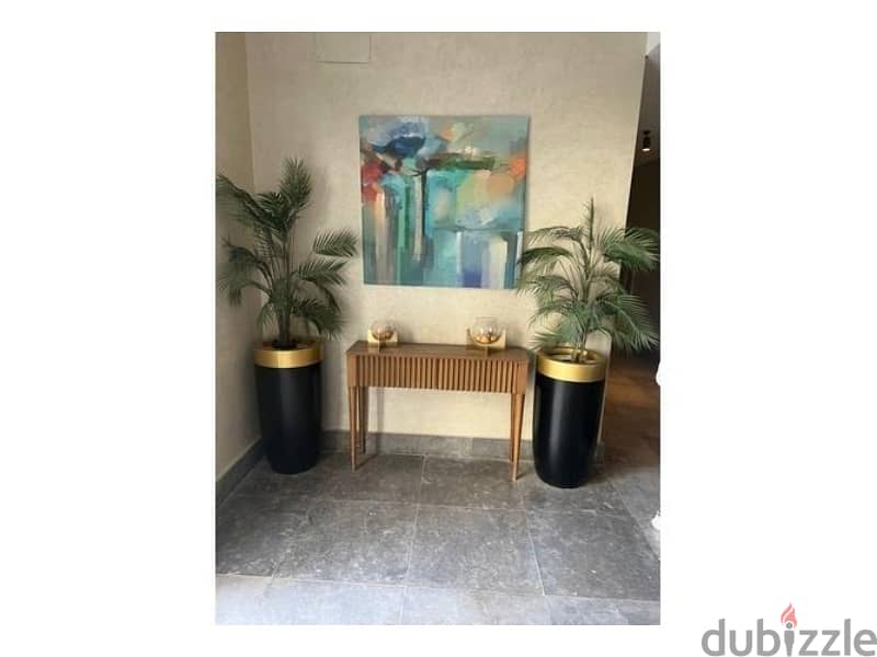 For sale, 165 sqm apartment, fully finished, ready to move cash, with a prime view, in Mountain View iCity Compound, New Cairo 9