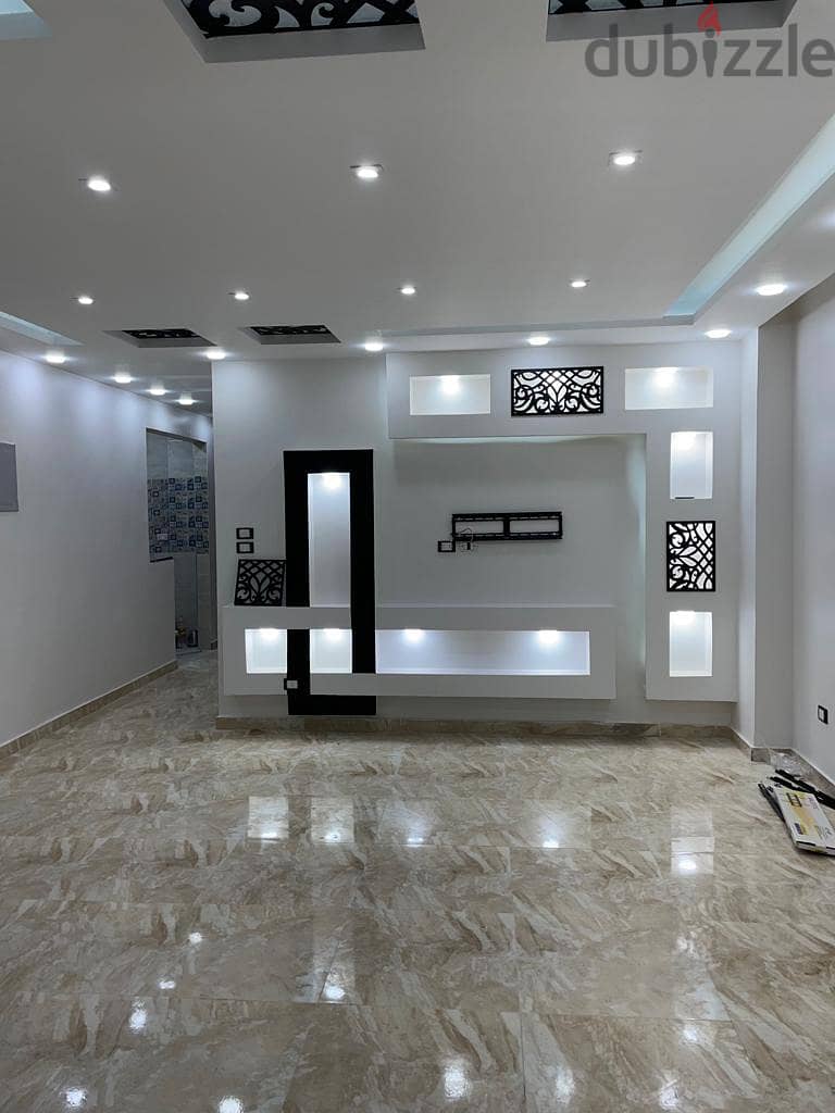 Duplex for sale, ultra super luxury, Al Ferdous villas, in front of Dreamland 2