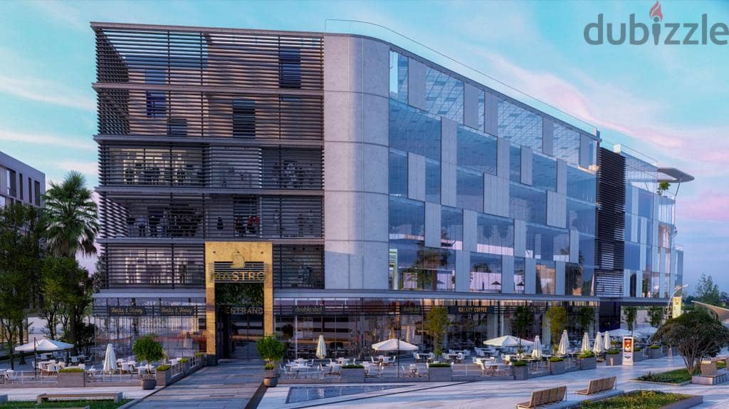 Ground floor store with the lowest down payment and the most distinguished shopping and promenade mall in front of the Al Masa Hotel and the monorail 7