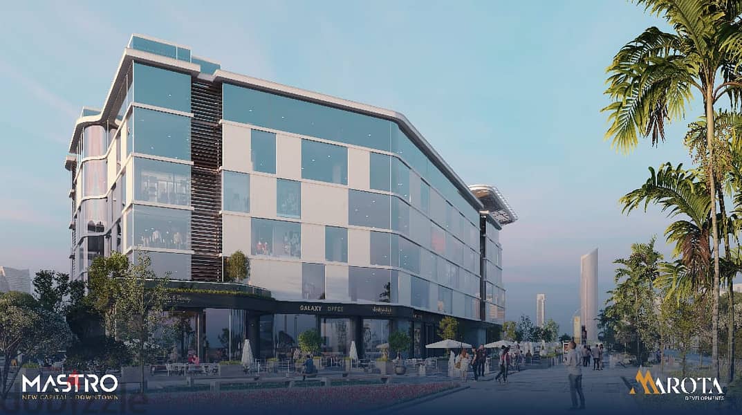 Ground floor store with the lowest down payment and the most distinguished shopping and promenade mall in front of the Al Masa Hotel and the monorail 8