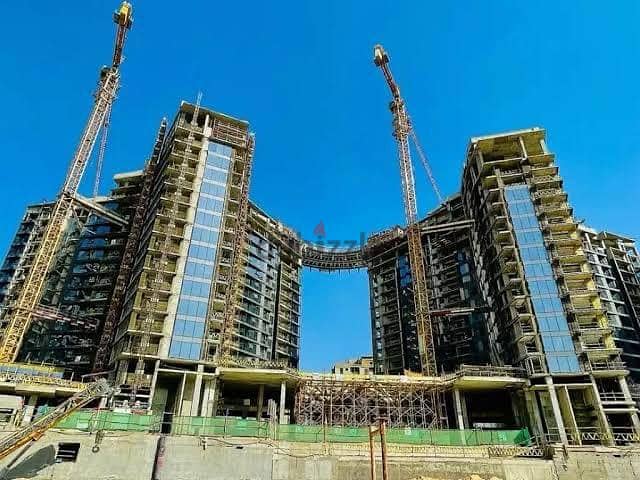 For sale, a hotel finishing apartment with air conditioners, fantastic view, in Zed West Towers, Sheikh Zayed, minutes from Hyper One, next to Al-Ahly 7