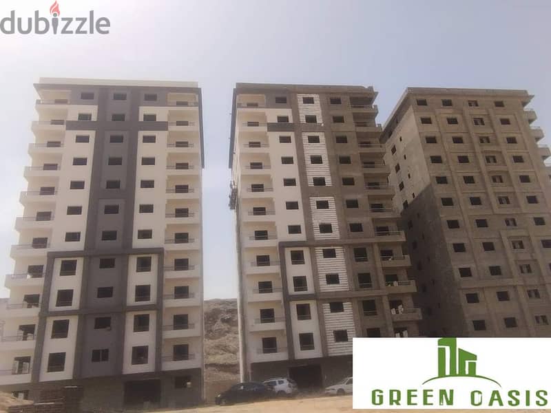Received immediately at a snapshot price. . 100 sqm apartment for sale in installments in Nasr City, Al-Waha District, in the Green OASIS Compound. 6