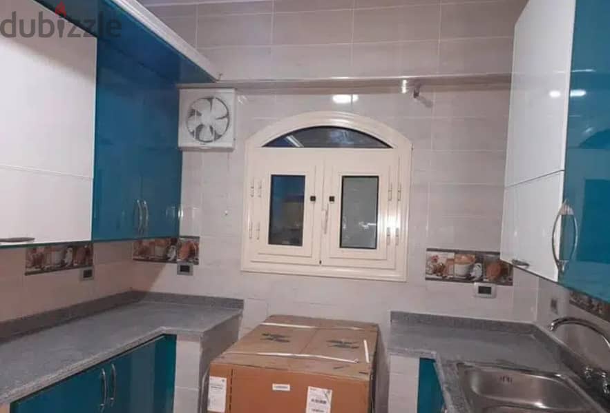 Apartment for sale with kitchen and air conditioners, New Cairo, Third District, near Fatima Al-Sharbatly Mosque and Al-Baghdadi Square.  First reside 9