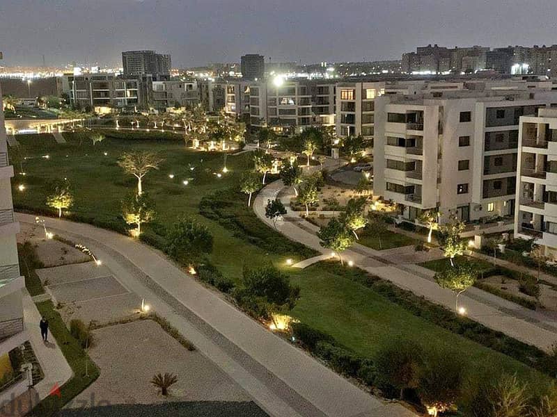 Apartment for sale in installments, first settlement on Suez Road, Taj City Compound 3