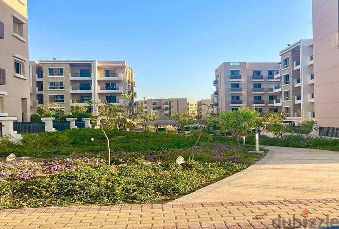 Apartment for sale in installments, first settlement on Suez Road, Taj City Compound 6