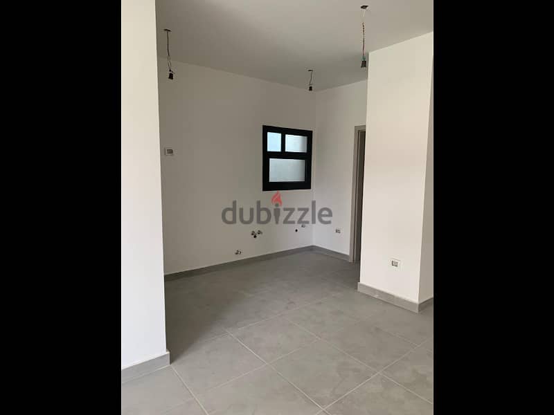 Apartment with garden for rent in Al Burouj 14