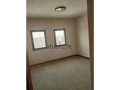 Apartment for rent in Mivida with Kitchen & ACs  .
