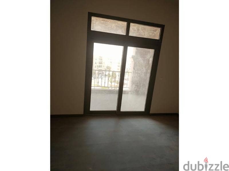 Apartment for rent in Mivida with Kitchen & ACs  . 1