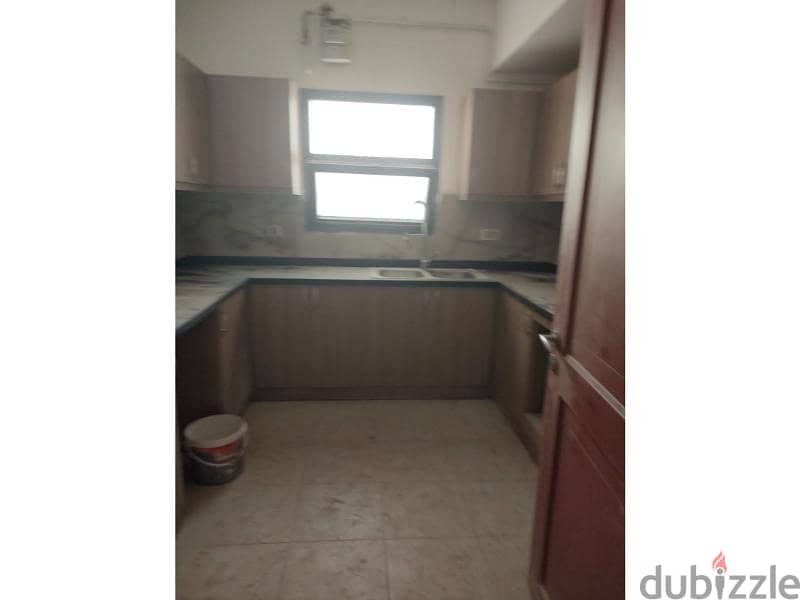 Apartment for rent in Mivida with Kitchen & ACs  . 8