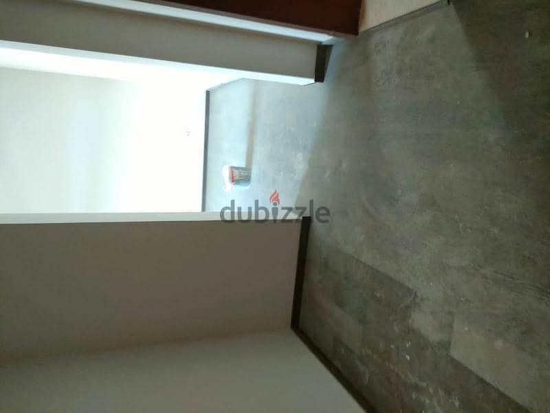 Apartment for rent in Mivida with Kitchen & ACs  . 13