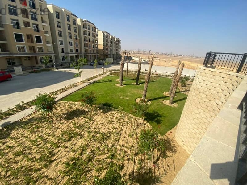 128sqm apartment with a garden with a prime view, ready to move in Sarai Mostakbal City Compound 6