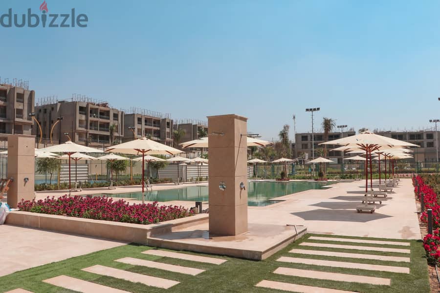 For sale apartment with garden  in Al Marasem View Landscape, under market price 8