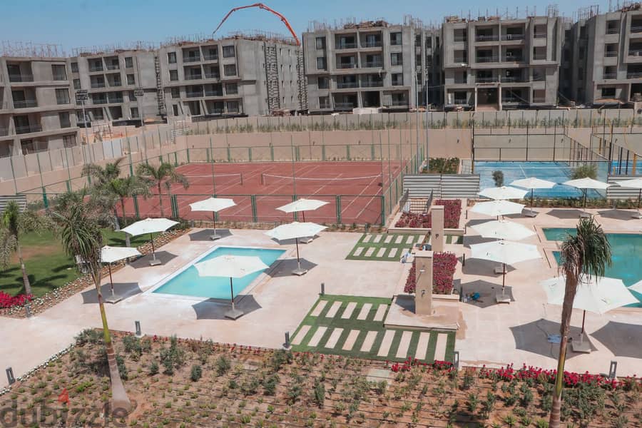 For sale apartment with garden  in Al Marasem View Landscape, under market price 9