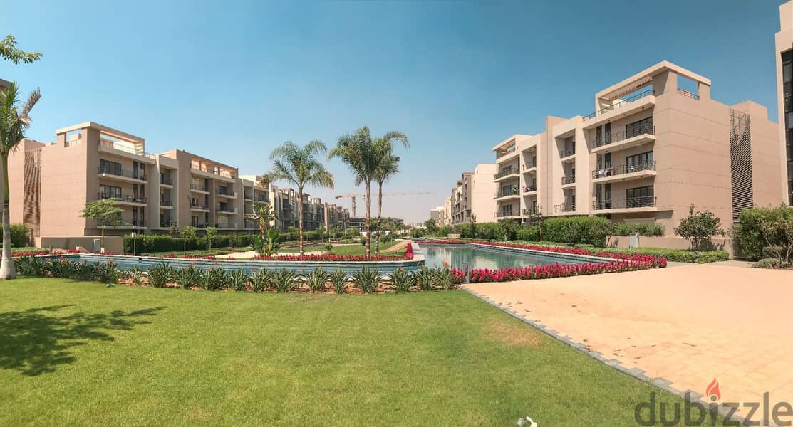 For sale apartment with garden  in Al Marasem View Landscape, under market price 10