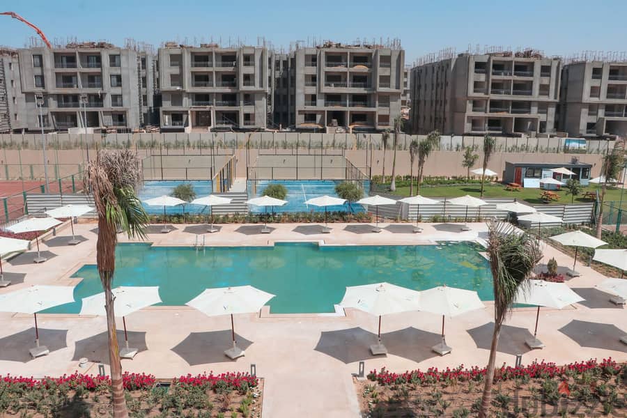 For sale apartment with garden  in Al Marasem View Landscape, under market price 15