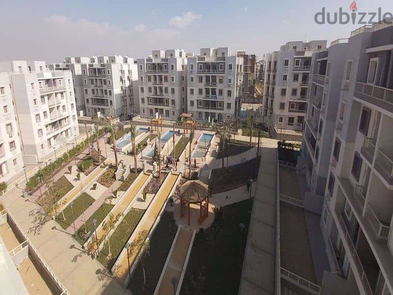 Apartment with garden for sale in installments in Jade Compound in front of Al-Rehab, immediate receipt, Fifth Settlement 2