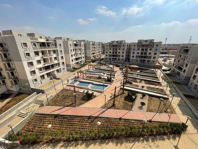 Apartment with garden for sale in installments in Jade Compound in front of Al-Rehab, immediate receipt, Fifth Settlement 6