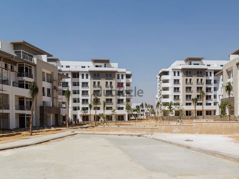 With just a 5% down payment, a luxurious apartment for sale, 115 sqm, with a private garden and a landscape view, available on installment in Hyde Par 2
