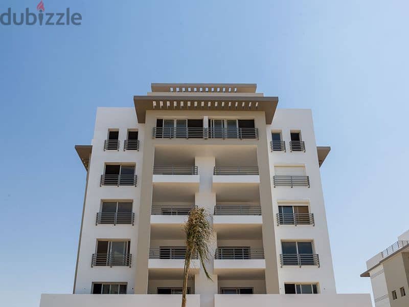 With just a 5% down payment, a luxurious apartment for sale, 115 sqm, with a private garden and a landscape view, available on installment in Hyde Par 7