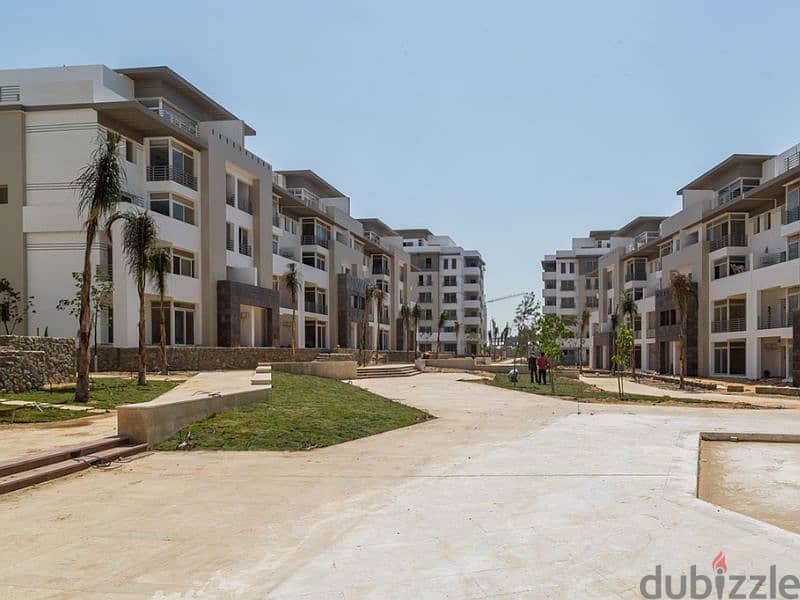 With just a 5% down payment, a luxurious apartment for sale, 159 sqm, with a private garden and a landscape view, available on installment in Hyde Par 2