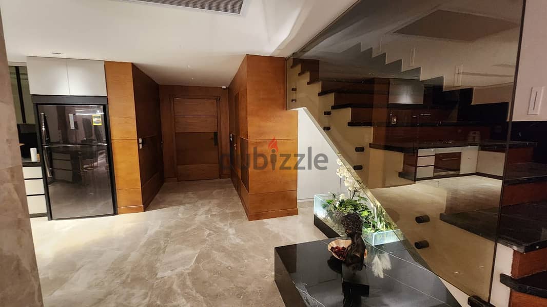 twin house at Emaar Mivida New Cairo اعمار ميفيدا   fully finished with furniture very prime location for sale 6