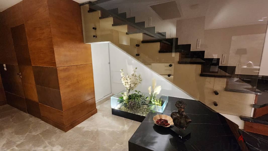 twin house at Emaar Mivida New Cairo اعمار ميفيدا   fully finished with furniture very prime location for sale 12