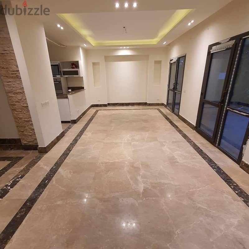 Ground apartment with garden for rent at Sodic Westown , Sheikh zayed 1