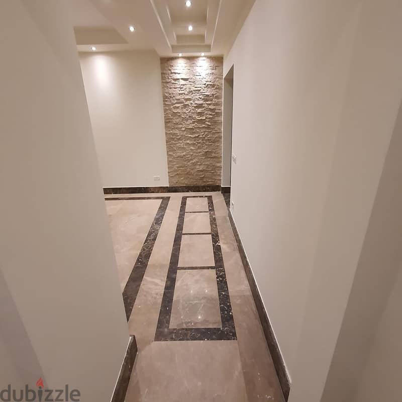 Ground apartment with garden for rent at Sodic Westown , Sheikh zayed 2