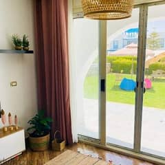 ground+garden chalet for sale in sedi abdelrahman  3BR mountain view north coast next to marassi ( first row on crystal lagoon)finished with sea view
