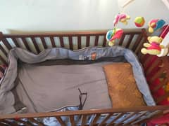 baby bed with toy