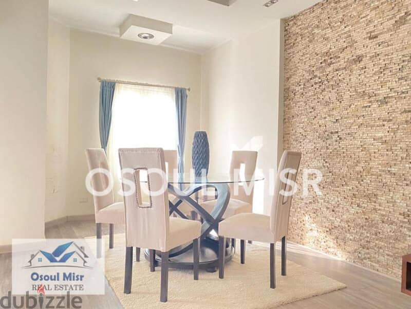 Apartment for sale in Mohandiseen, fully equipped, overlooking a garden 4