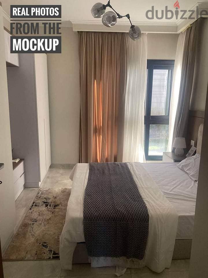 Furnished and finished chalet with a down payment of 317 thousand, two rooms, view on the swimming pool, for sale in Sidi Abdel Rahman, North Coast 2