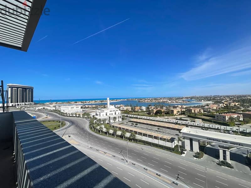 Corner Chalet Panoramic view El Alamein Towers, The Gate Tower and Marina 7 in the most distinguished building in Mazarine 5