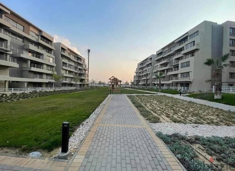 Apartment for sale in the Fifth Settlement, Taj City Compound, directly on the Suez Road, minutes from Heliopolis and Nasr City, in installments and t 5