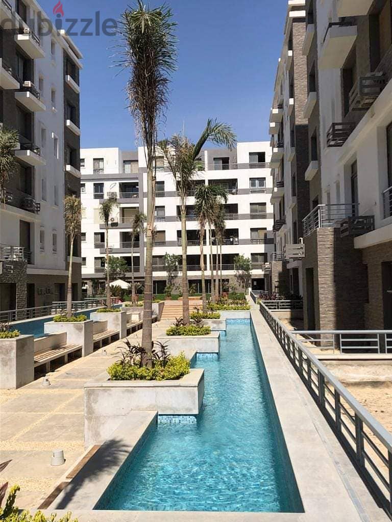 Apartment for sale in the Fifth Settlement, Taj City Compound, directly on the Suez Road, minutes from Heliopolis and Nasr City, in installments and t 13