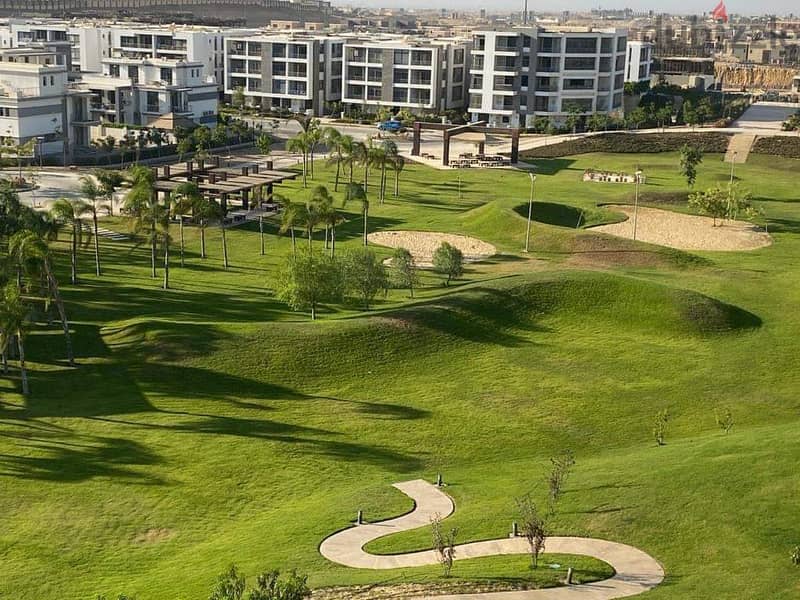 Apartment for sale in the Fifth Settlement, Taj City Compound, directly on the Suez Road, minutes from Heliopolis and Nasr City, in installments and t 22